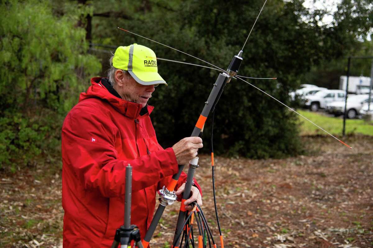 Retired software engineer and Vietnam veteran Skip Fedanzo disassembles his ham radio antenna after a disaster training practice with Radio Communication Volunteers in Marin County.