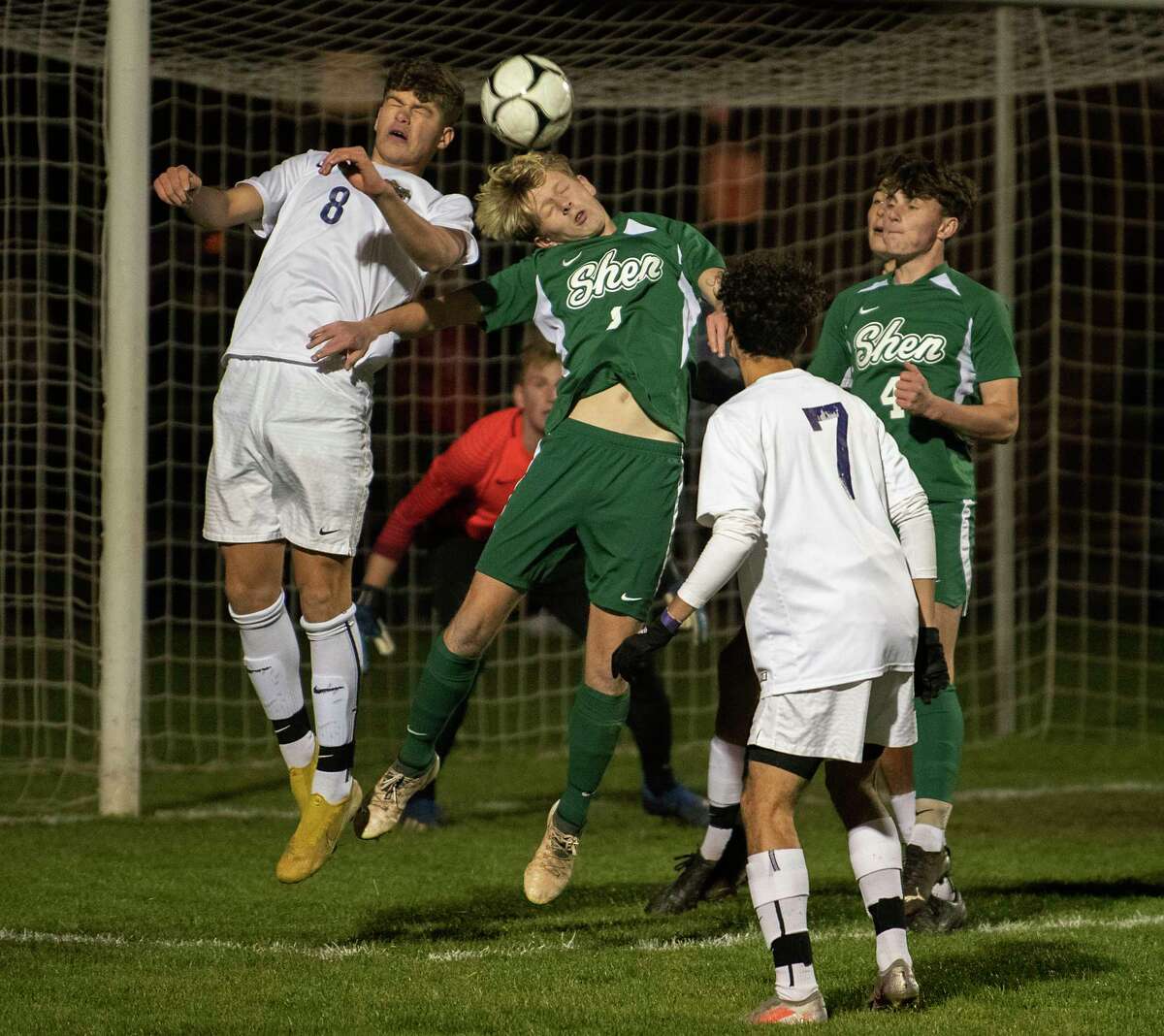 CBA’s Benjamin Bern, left, battles to head the ball with Shenendehowa’s Conor Brown in corner kick attempt during the Class AA boys' soccer final on Monday, Nov. 1, 2021 in Colonie, N.Y.