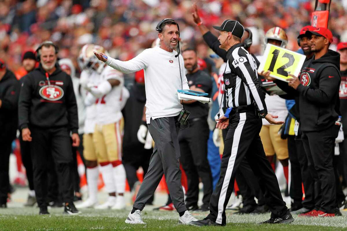 San Francisco 49ers head coach Kyle Shanahan speaks to an official during Sunday’s 33-22 win over the Chicago Bears at Soldier Field
