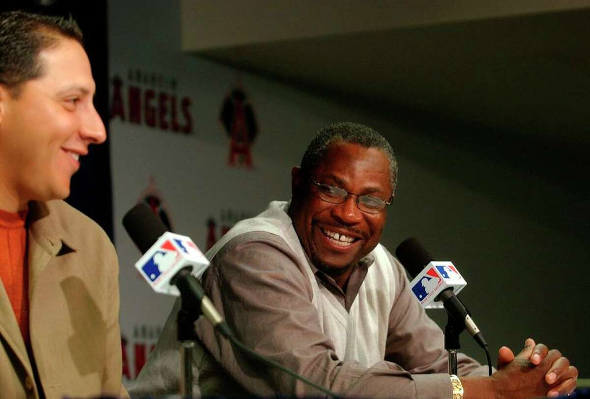 Giants manager Dusty Baker (right) and pitcher Russ Ortiz answer questions the day before Game 6 of the 2002 Series.