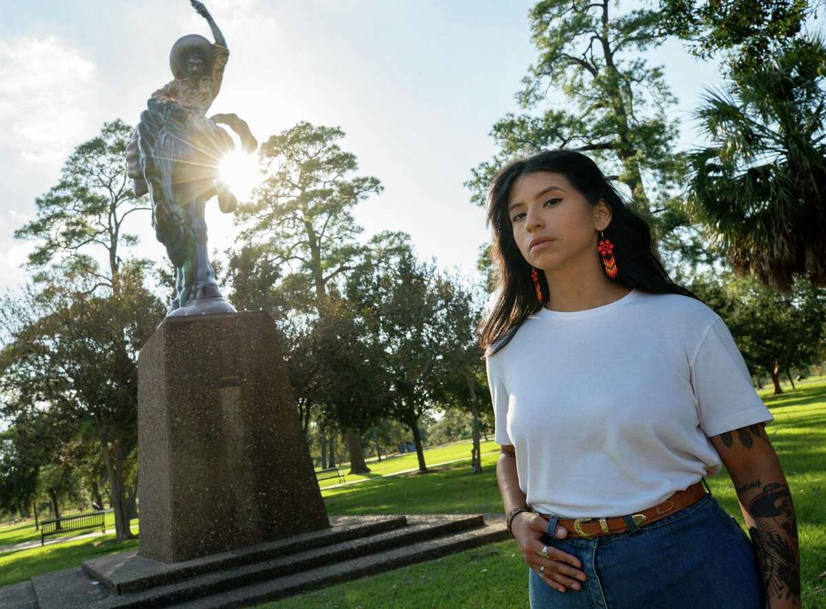 Ashley Solis in Moody Park, near where she grew up, on Monday, Nov. 1, 2021, in Houston. Solis, 28, a Houston massage therapist, is one of nearly two dozen women who accused Texans quarterback Deshaun Watson of sexual misconduct last spring. She said for Watson to “come in and abuse a woman from this town like this lights a fire inside of me… I think he’s unaware of the strength of this community and people he decided to mess with.”