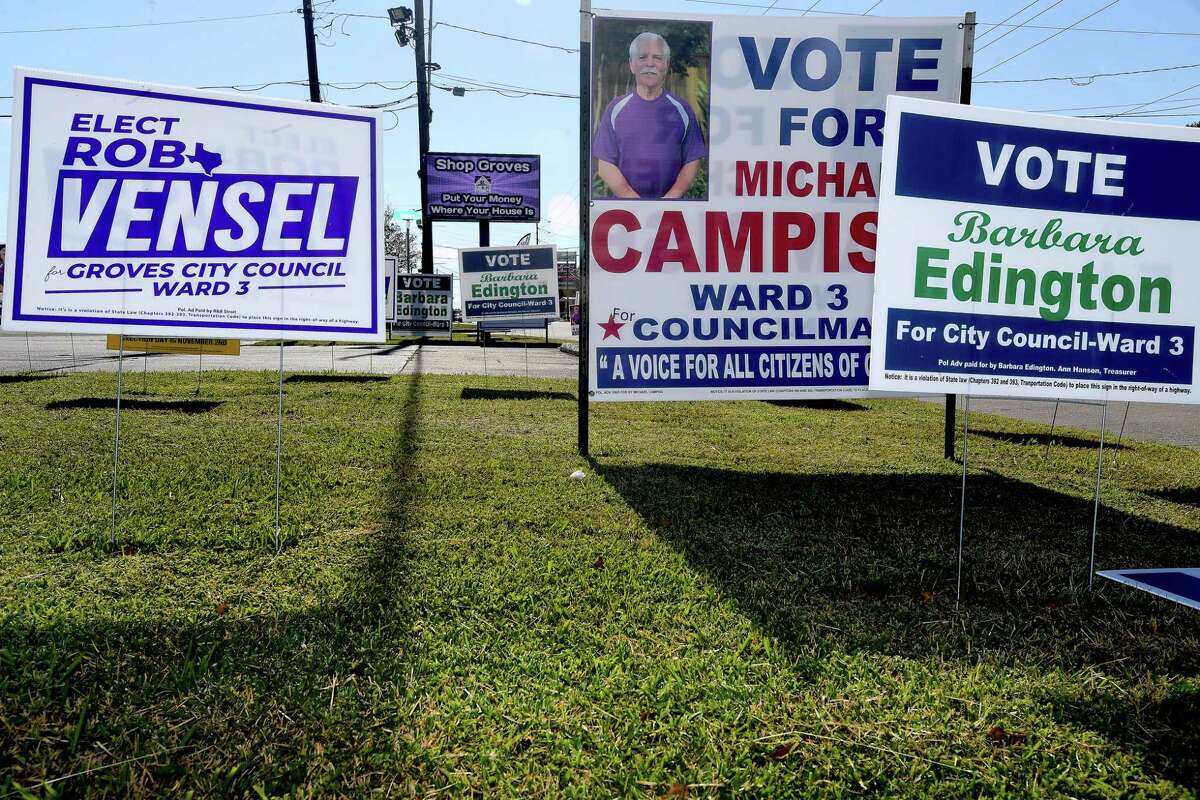 Election signs fill the walk outside Groves City Hall before Tuesday's election. Groves and Bevil Oaks voters will both head to the polls for elected positions and propositions. Photo made Monday, November 1, 2021 Kim Brent/The Enterprise