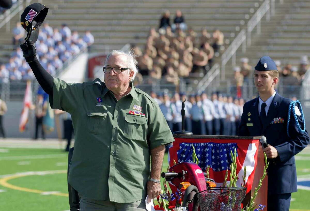 Retired United States Marine Corps Cpl. Jimmie Edwards III acknowledges the crowd after speaking during Conroe ISD’s annual Veterans Day celebration at Woodforest Bank Stadium, Friday, Nov. 10, 2017, in Shenandoah. The Conroe ISD Salute to Veterans is set for 10 a.m. on Veterans Day at the Woodforest Bank Stadium.