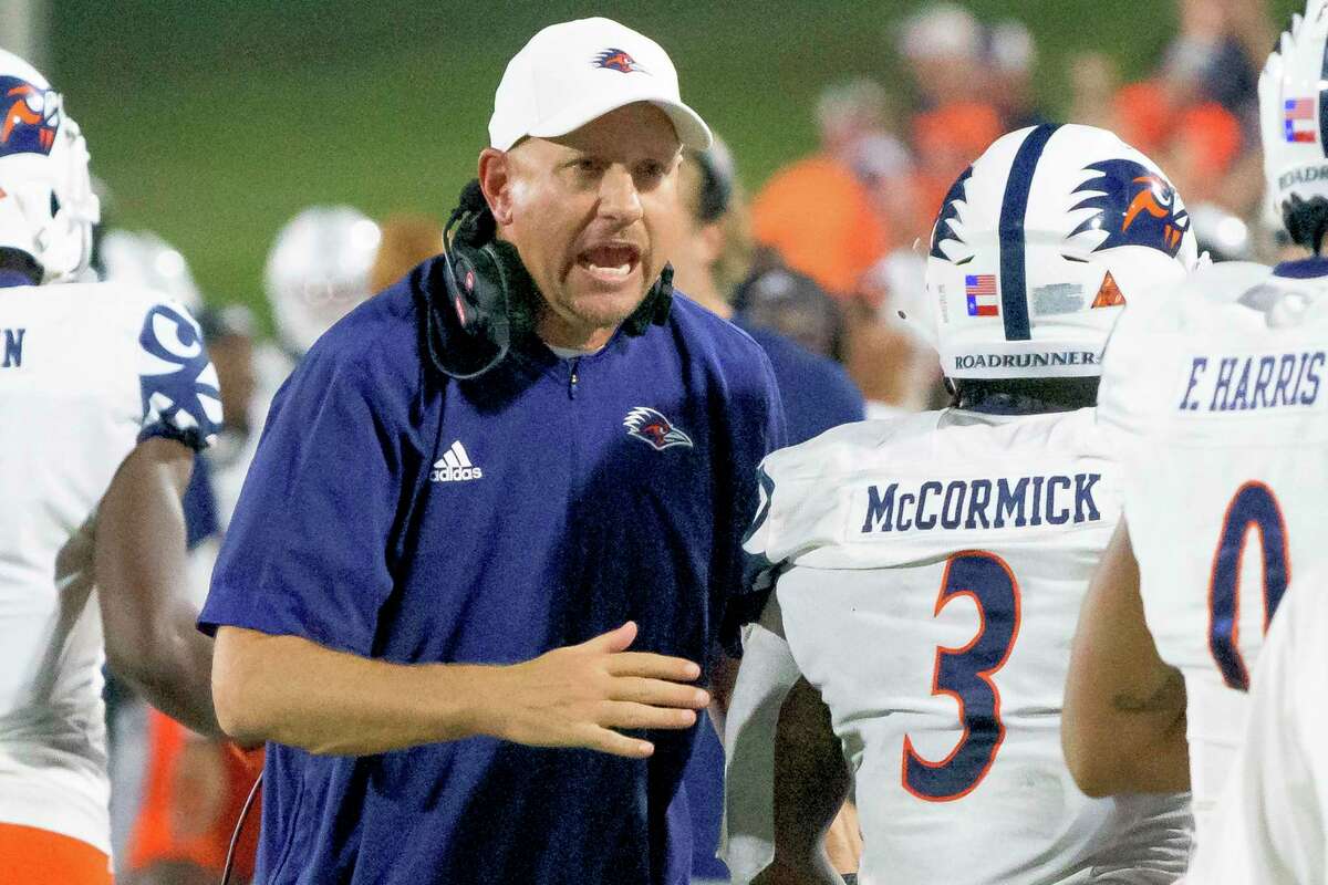 UTSA head coach Jeff Traylor celebrates a touchdown with running back Sincere McCormick (3) in the first half against Louisiana Tech in Ruston, La., Saturday, Oct. 23, 2021.