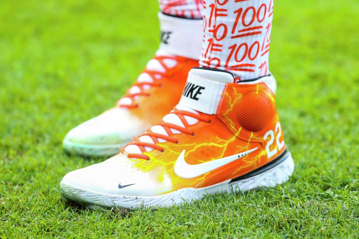 Houston Astros center fielder Jose Siri (26) wears orange cleats with the number 22 on them during batting practice before Game 6 of the World Series on Tuesday, Nov. 2, 2021 at Minute Maid Park in Houston.