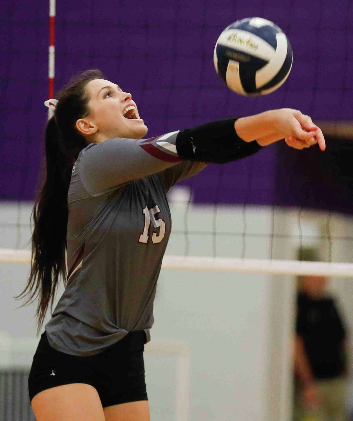 Magnolia defensive specialist Kaylyn Fojt (15) makes a pass in the first set of a Region III-5A bi-district volleyball playoff match at Montgomery High School, Tuesday, Nov. 2, 2021, in Montgomery.