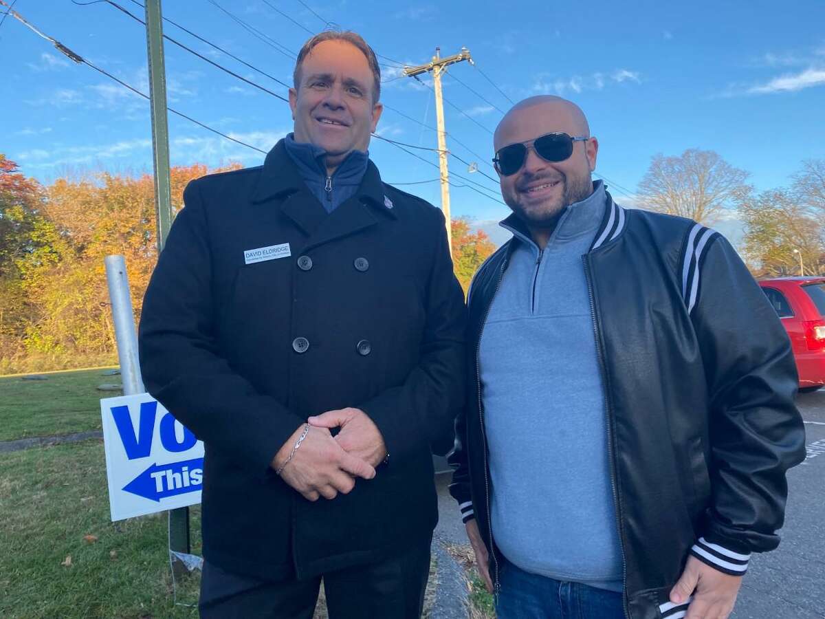 Democratic mayoral candidate David Eldridge, left, with his campaign manager Jimmy Capra, stopped by Elizabeth Shelton School about 8:30 a.m. Tuesday, Nov. 2, 2021, to greet voters. Eldridge is challenging incumbent Mayor Mark Lauretti, who is seeking his 16th consecutive term.