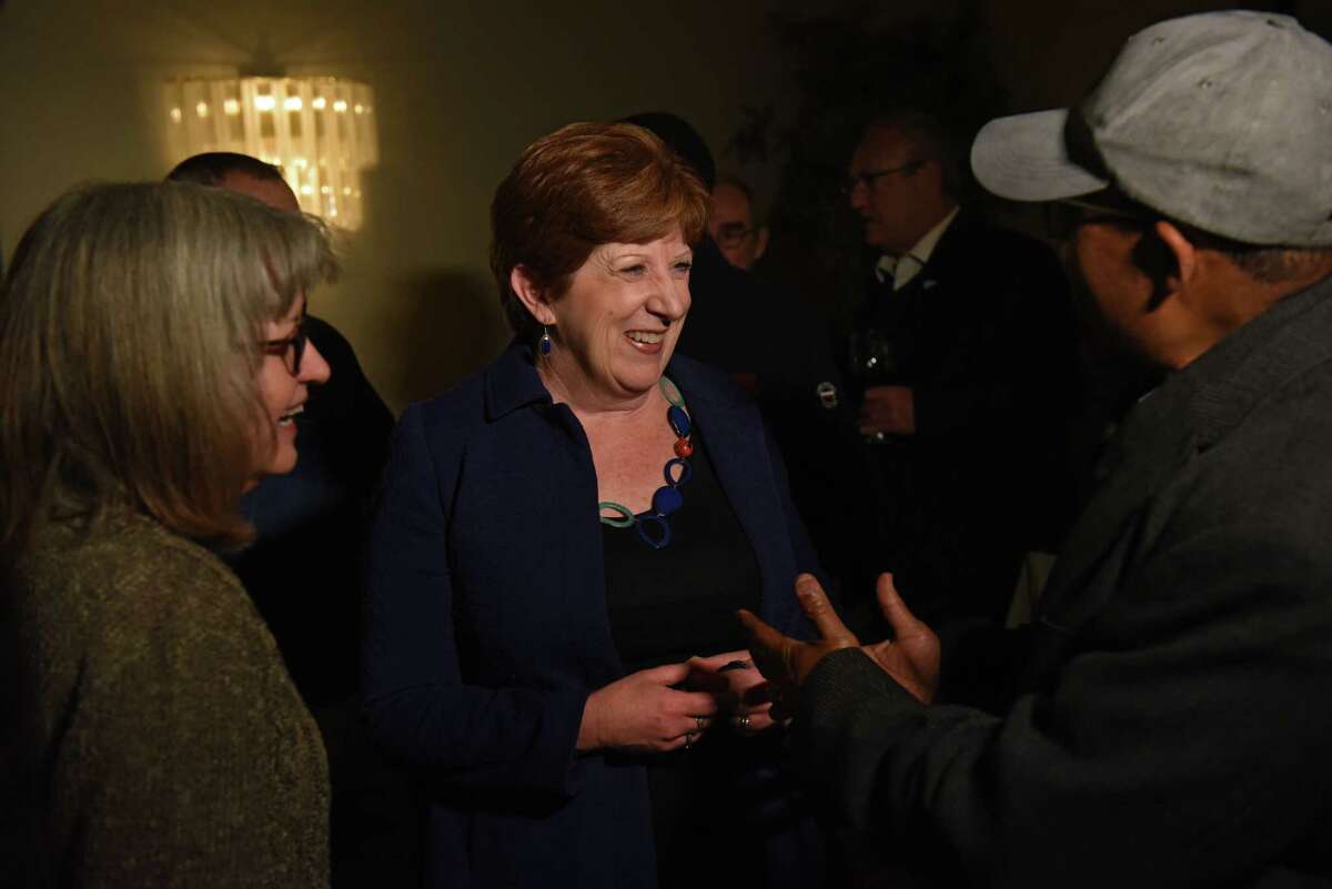 Albany Mayor Kathy Sheehan talks with Democratic supporters after declaring victory during an election watch party at the Italian American Community Center on Tuesday, Nov. 2, 2021 in Albany, N.Y.