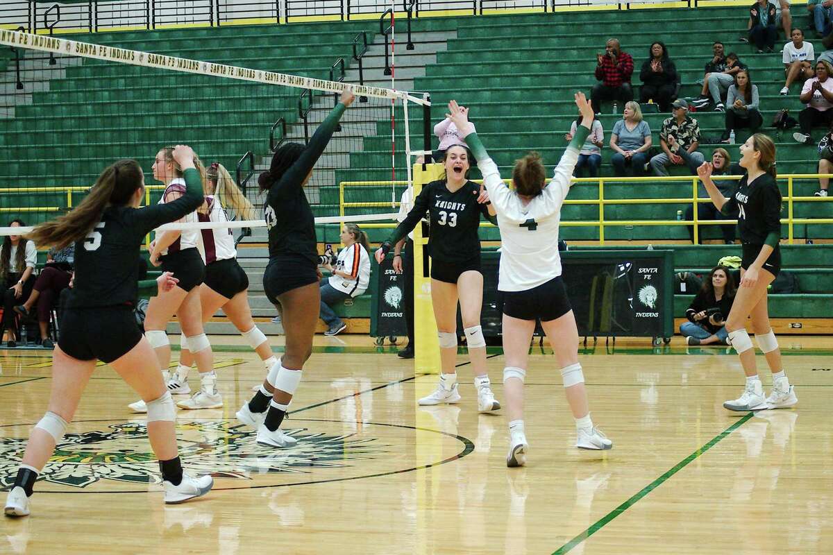 Clear Falls celebrates a point scored against Pearland Tuesday, Nov. 2, 2021 at Santa Fe High School.