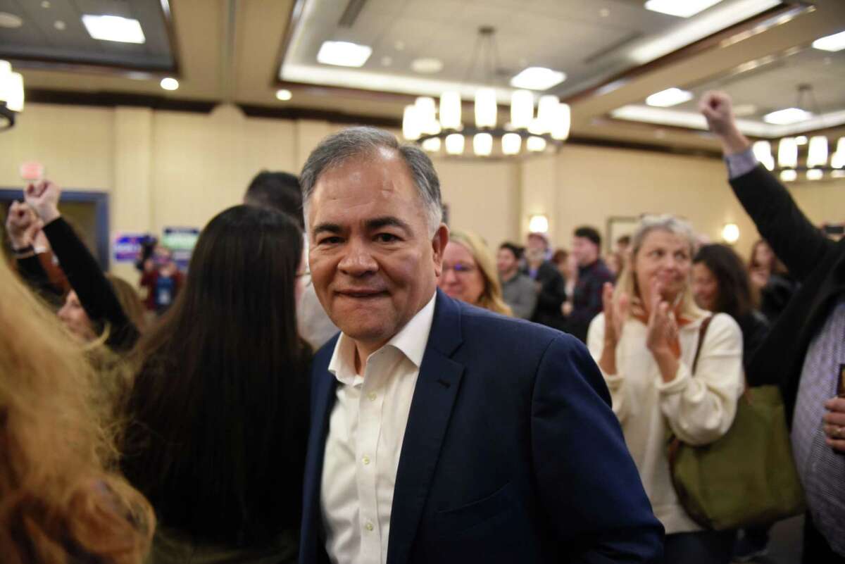 Saratoga Springs Mayor Ron Kim celebrates with supporters on election night on Tuesday, Nov. 2, 2021, at the Embassy Suites in Saratoga Springs, N.Y. Kim said the city's zoning ordinance was not passed properly and will have to be voted on again in 2022.