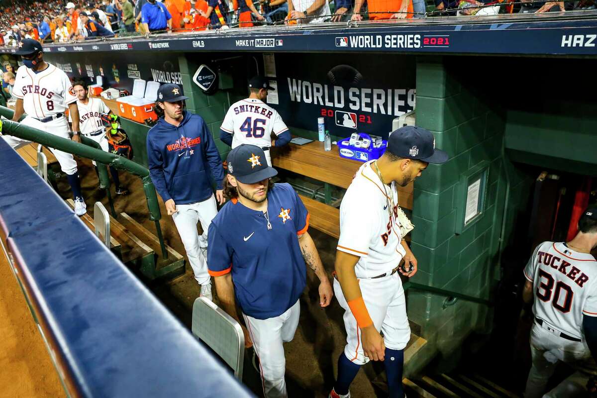 Astros players walk back into their clubhouse as the Atlanta Braves celebrate their World Series title with a 7-0 win of Game 6 of the World Series on Tuesday, Nov. 2, 2021 at Minute Maid Park in Houston.