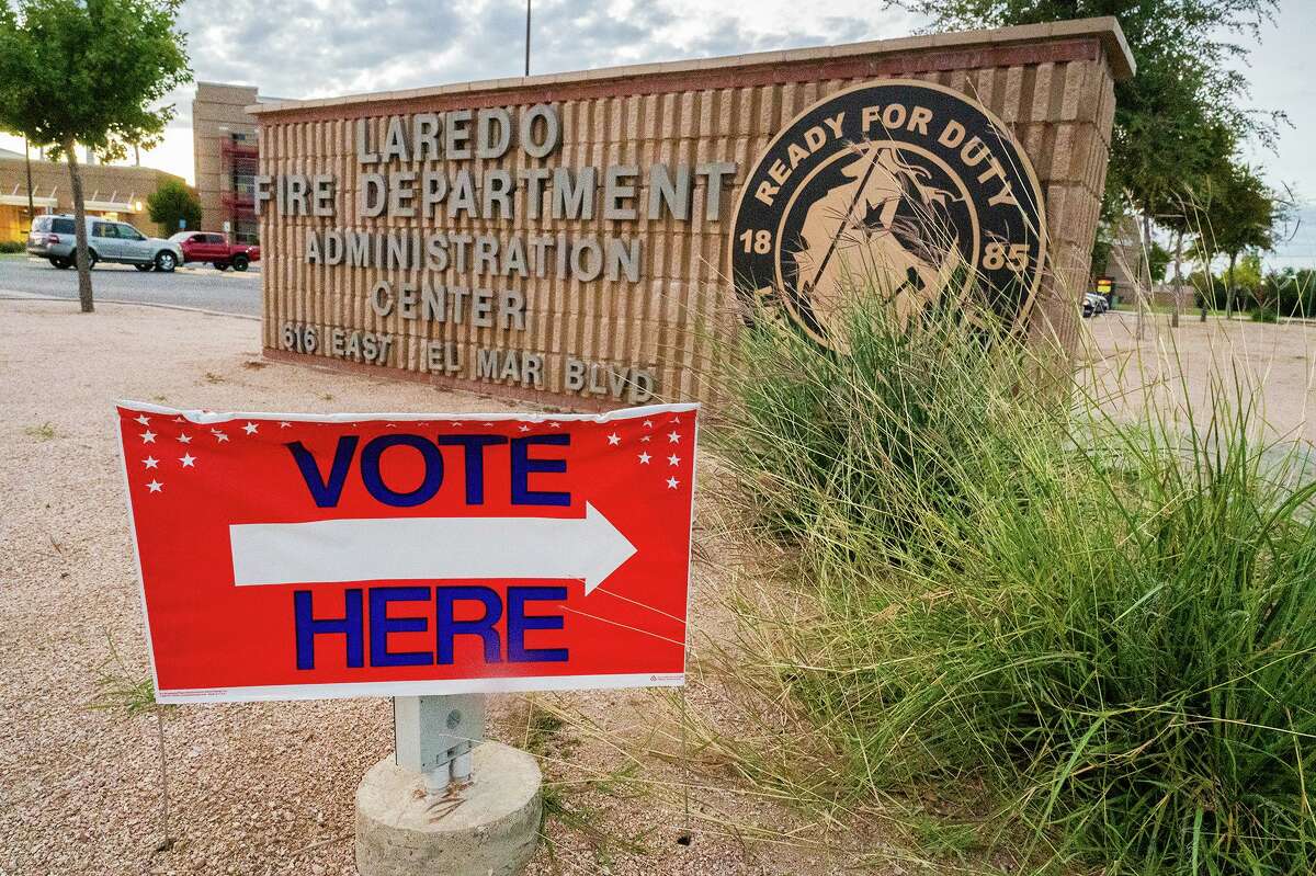 A Vote Here sign is seen outside the Laredo Fire Department Adminsitration building, Wednesday, Oct. 20, 2021.