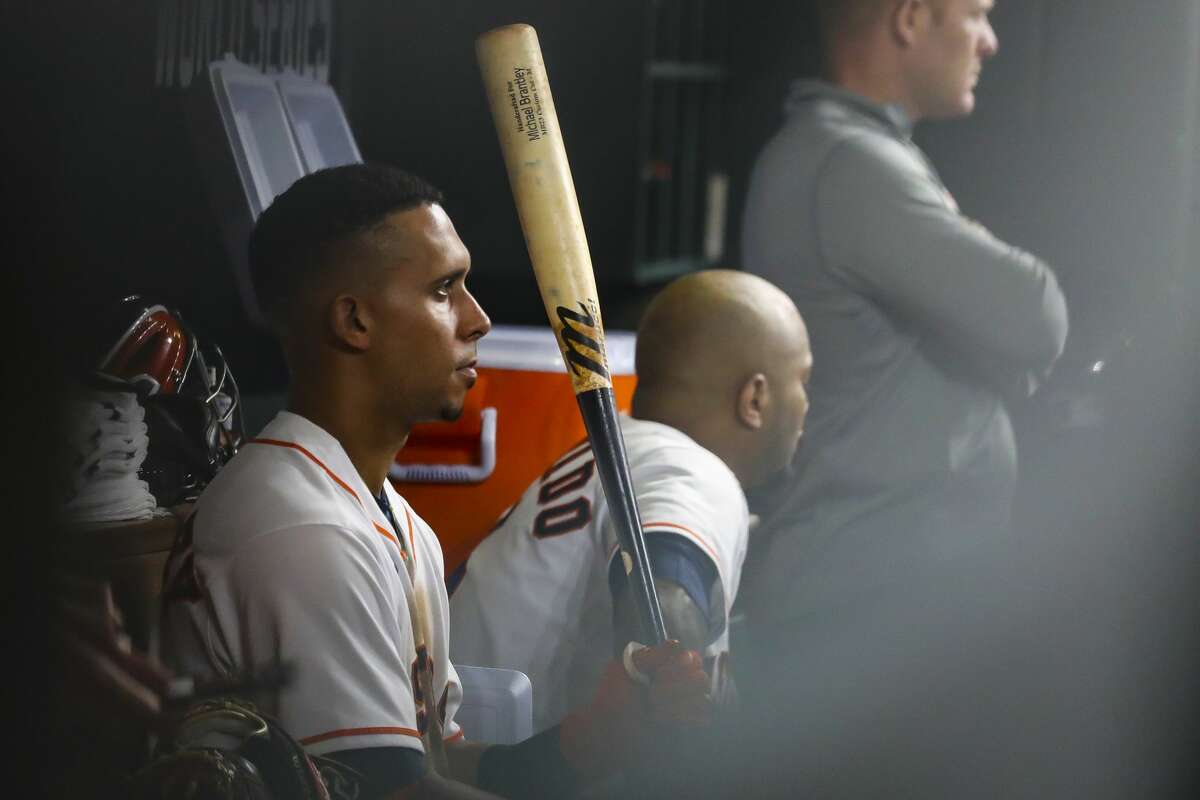 Houston Astros left fielder Michael Brantley (23) sits in the dugout during the eighth inning of Game 6 of the World Series on Tuesday, Nov. 2, 2021 at Minute Maid Park in Houston.