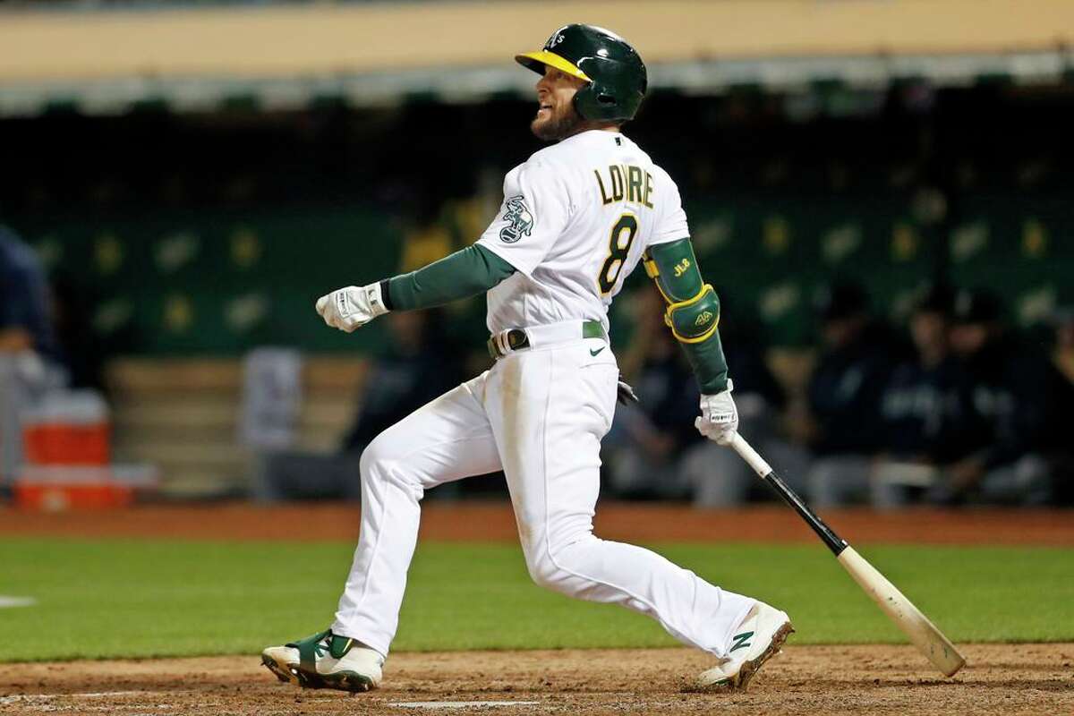 Oakland A’s reinstate Jed Lowrie from COVID-related injured list. Oakland Athletics' Jed Lowrie doubles in 7th inning against Seattle Mariners during MLB game at Oakland Coliseum in Oakland, Calif., on Monday, August 23, 2021.