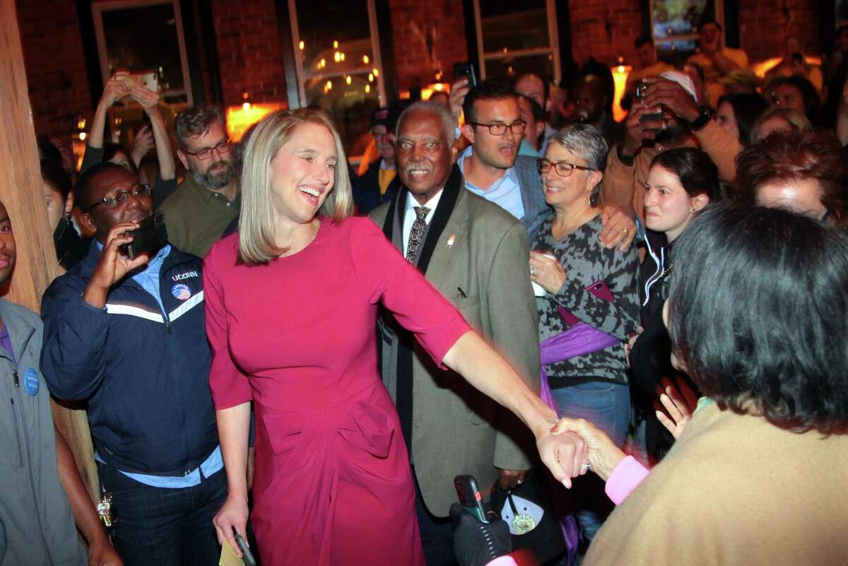 Democratic mayoral candidate Caroline Simmons arrives and greets her supporters at Third Place by Half Full Brewery to celebrate her win on election night in Stamford, Conn., on Tuesday November 2, 2021. Unaffiliated candidate Bobby Valentine conceded the election.