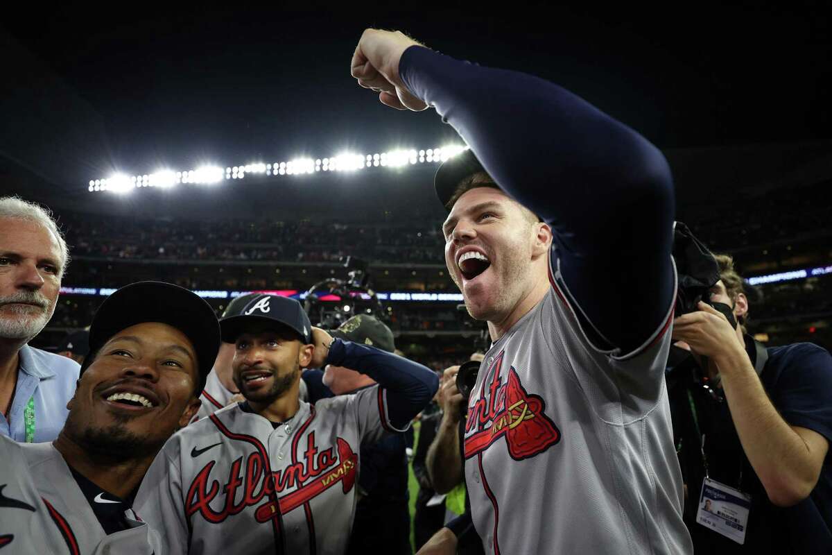 The Atlanta Braves celebrate their 7-0 victory against the Houston News  Photo - Getty Images