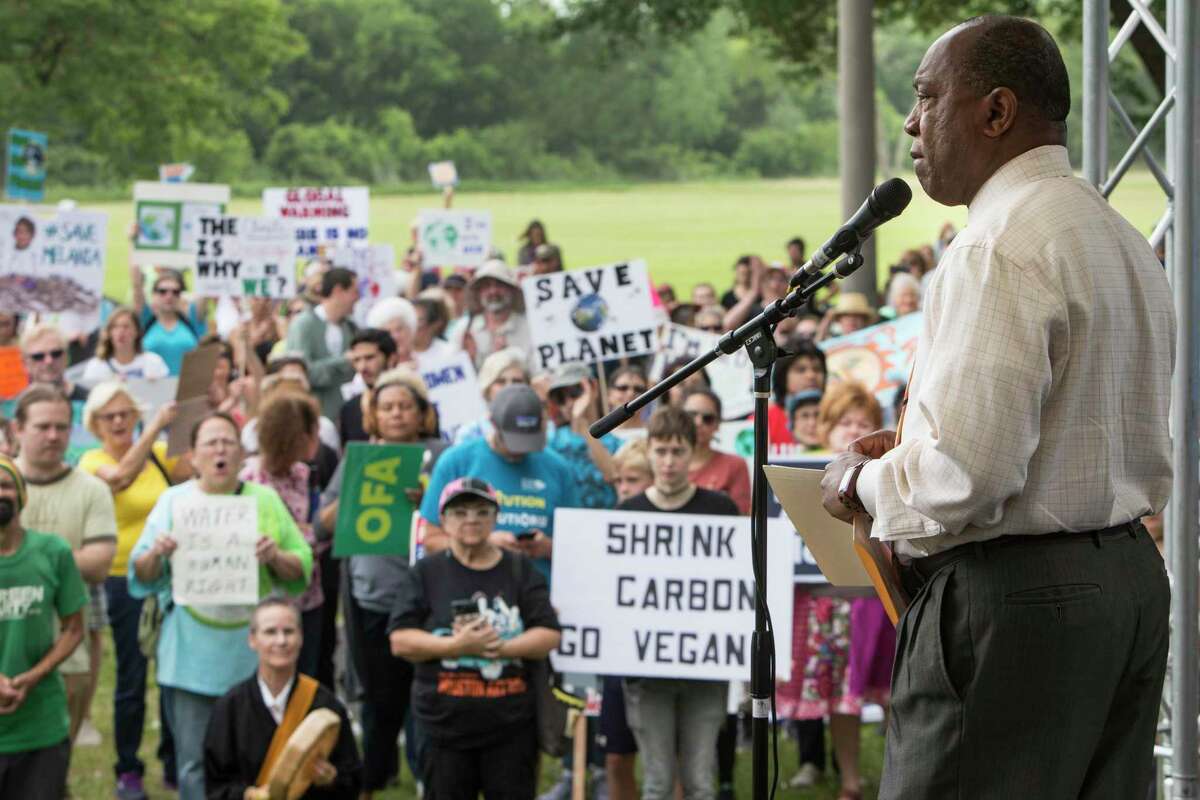 Mayor Sylvester Turner speaks to demonstrators during the Houston Climate March rally at Clinton Park in 2017. The mayor traveled to Glasgow, Scotland, this week to participate in the United Nations’ climate summit.