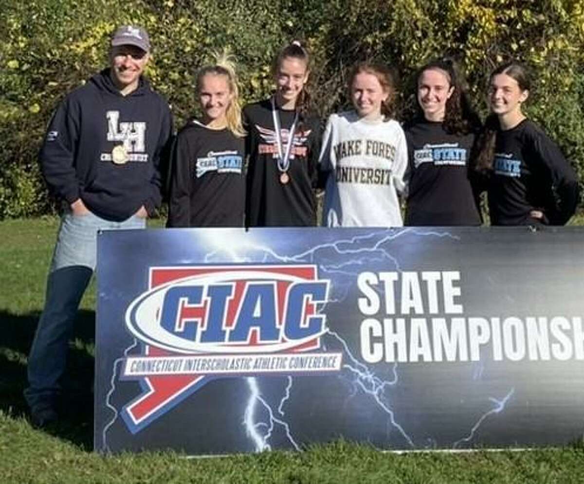 Lauralton placed 9th at the Class M cross country championships. Team members are coach Ellis Gill, Carys Cook, Kelly Jones, Maggie Willer, Brooke Jones and Laurel Micholovich.