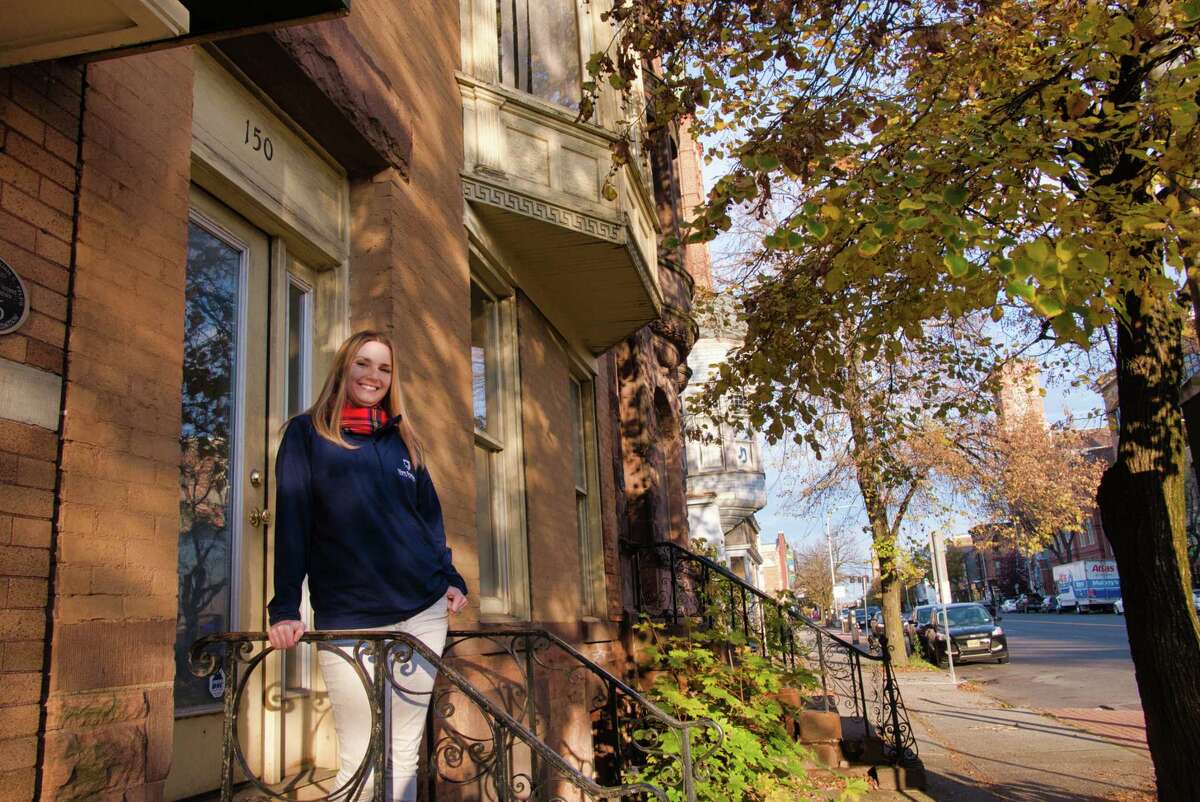 Samantha Curry, co-principal of New Scotland Development Companies and the broker of record for New Scotland Realty, outside of 150-152 Central Avenue on Wednesday, Nov. 3, 2021, in Albany, N.Y. Curry is the co-listing agent for the property which is for sale.