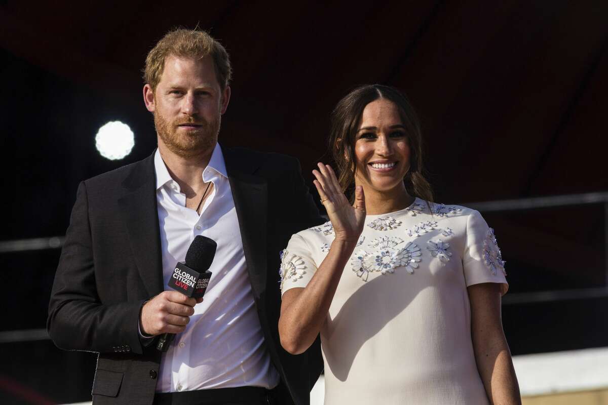 Prince Harry and Meghan Markle, Duke and Duchess of Sussex speak during the Global Citizen festival, Saturday, Sept. 25, 2021 in New York. Recently, Markle has been calling senators about passing a national paid leave program. (AP Photo/Stefan Jeremiah)