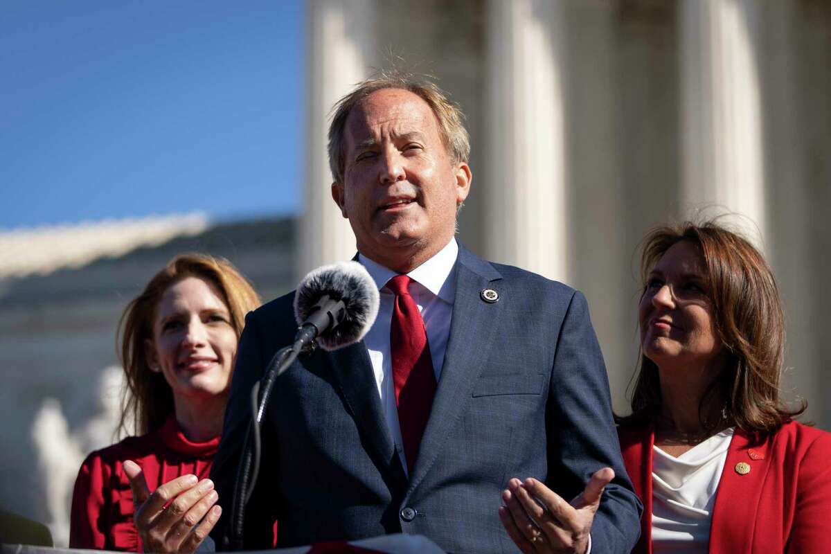 Texas Attorney General Ken Paxton speaks outside the U.S. Supreme Court Monday to discuss Texas’ law, which bans abortions after six weeks.