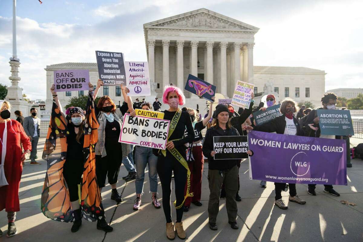 Demonstrators rally outside the U.S. Supreme Court on Monday as the arguments were made over Texas’ new abortion law.