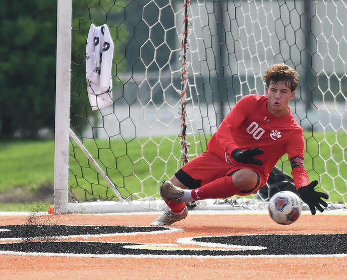 Nathan Beck makes a diving save during a game against De Smet inside the District 7 Sports Complex.
