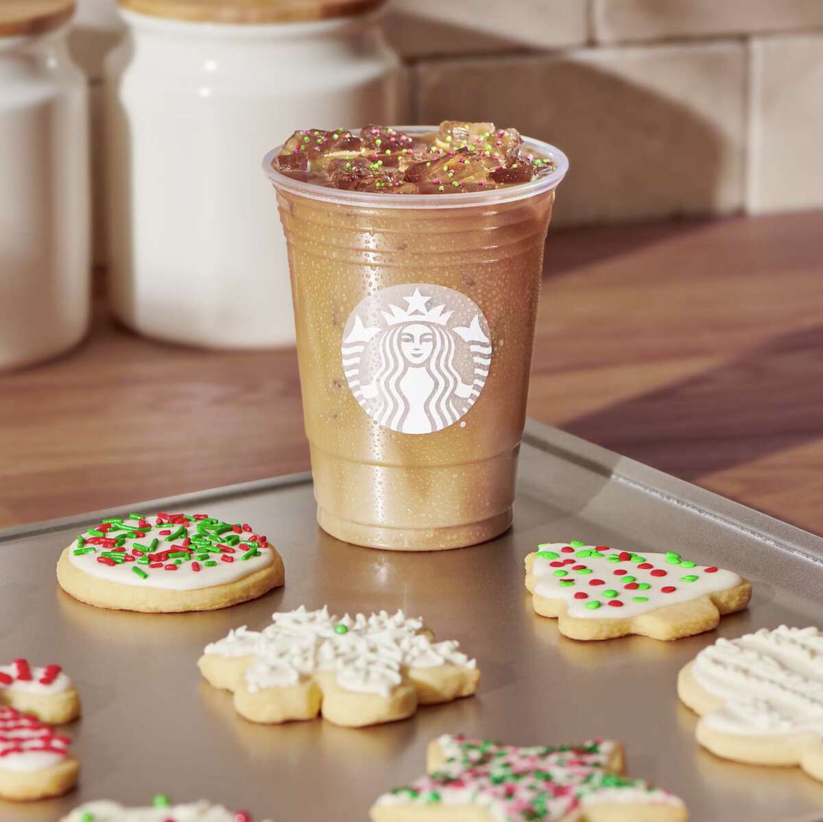 Starbucks is offering new holiday beverages such as the Iced Sugar Cookie Almondmilk Latte.
