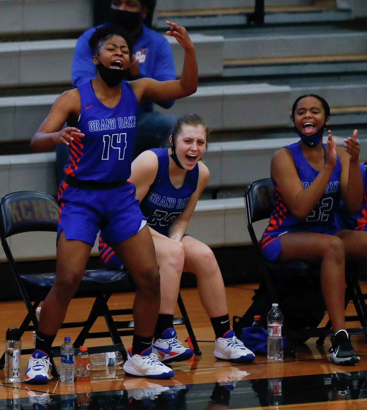 Grand Oaks guard Madison McCollister (14) reacts after a 3-pointer during the second quarter of a Region II-6A area girls basketball playoff game at Klein Collins High School, Saturday, Feb. 20, 2021, in Spring.