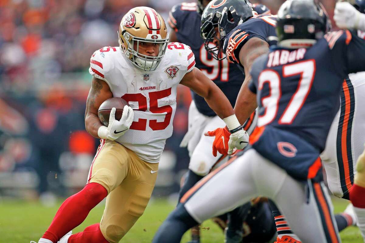 The 49ers and running back Elijah Mitchell, seen in a 33-22 road win over the Chicago Bears last season, will return to Soldier Field for the 2022 opener. A home game against the Seattle Seahawks follows as the 49ers look to break in their presumed starting quarterback, Trey Lance.