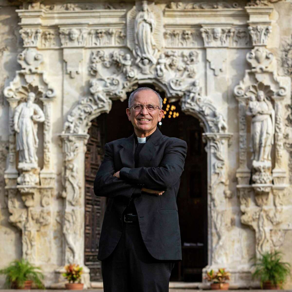 Father David Garcia, who is releasing his first book, "Pandemic Preaching," poses Tuesday, Oct. 26, 2021 at Mission San Jose. The book is a collection of homilies Garcia wrote during the first year of the pandemic.