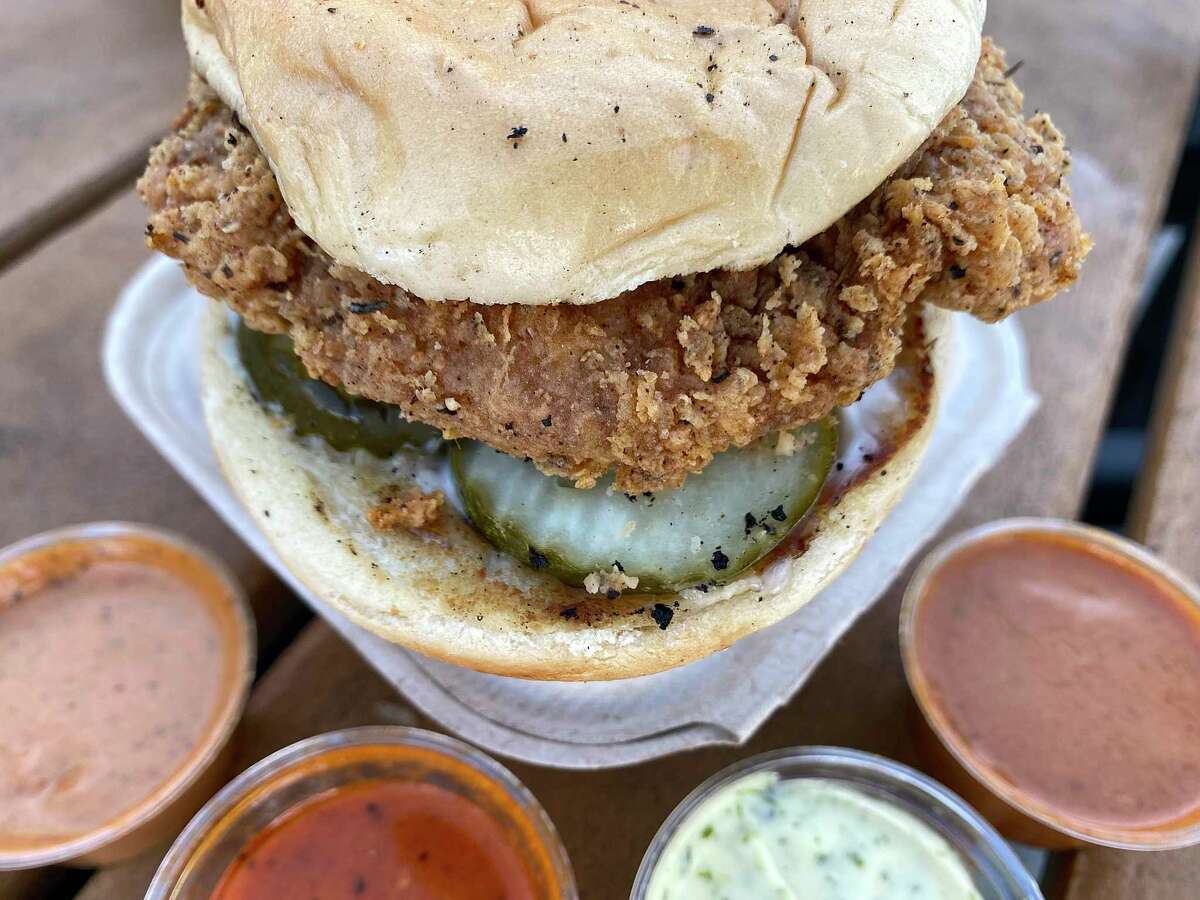 The Original Project at the Project Pollo trailer at Roadmap Brewing is a sandwich made with a vegan version of fried chicken with aioli and pickles, with optional sauces available.