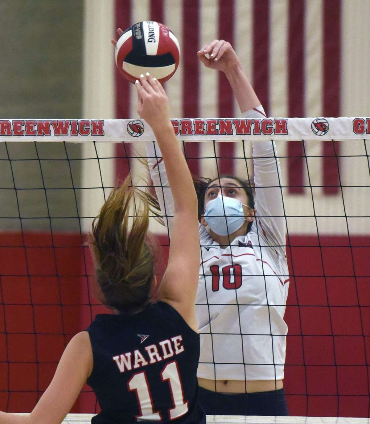 Greenwich’s Liana Sarkissian (10) blocks a shot by Warde’s Selina Torstere (11) during an FCIAC quarterfinal match in Greenwich on Tues., Nov. 2, 2021.