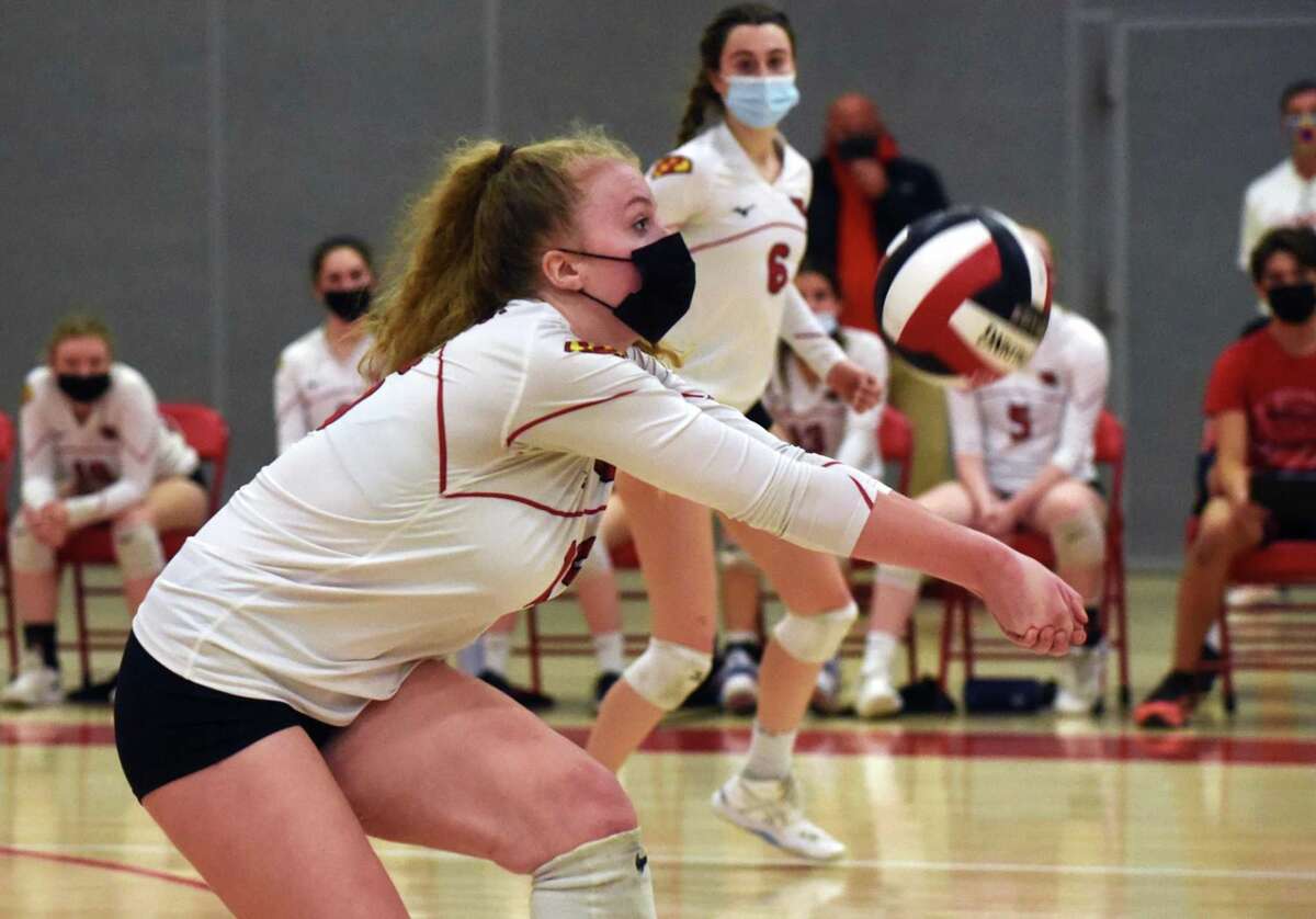 Greenwich’s Maggie Saleeby keeps the ball up against Warde during an FCIAC quarterfinal match. Greenwich retained the No. 1 spot in the latest Connecticut high school girls volleyball coaches poll.