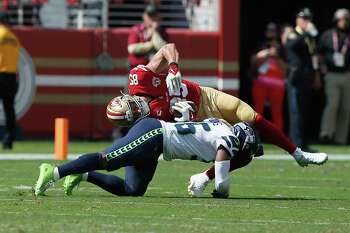 San Francisco 49ers tight end George Kittle (85) makes a catch during an  NFL football game against the Seattle Seahawks, Sunday, Oct. 3, 2021 in  Santa Clara, Calif. (AP Photo/Lachlan Cunningham Stock