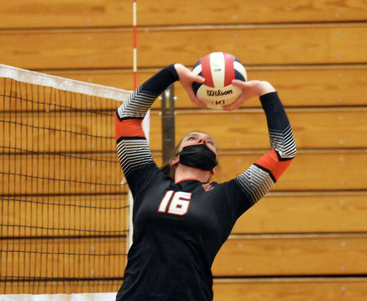 Edwardsville’s Lexie Griffin sets a teammate during the second set Wednesday against Normal Community in Pekin.