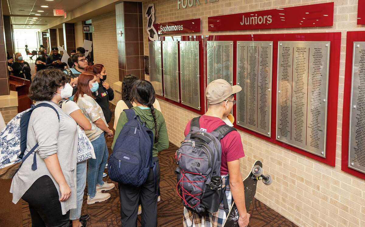 Texas A&M International University freshmen read their peers’ names who on are on track to graduate, Tuesday, Nov. 2, 2021, after revealing the recognized names in a wall dedication ceremony at the TAMIU Senator Judith Zaffirini Student Success Center.