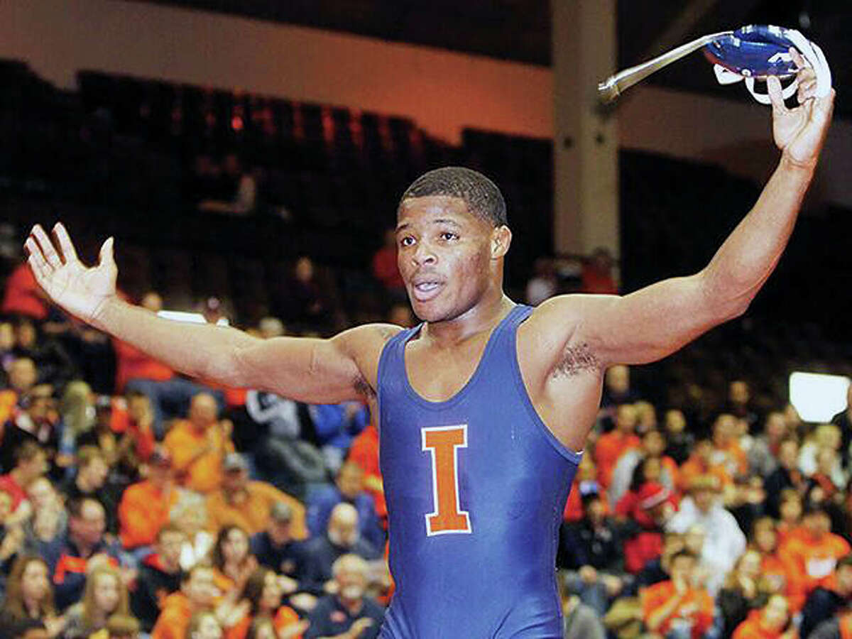 Daryl Thomas, a 2008 Edwardsville High School graduate, celebrates a win during his days as a wrestler at the University of Illinois. Thomas has been hired as associate head coach for the SIUE wrestling team.