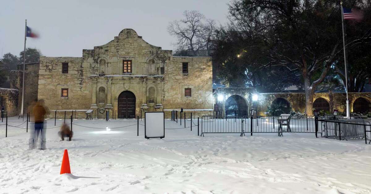 The Alamo sits in the snow on the early morning of February 15th.