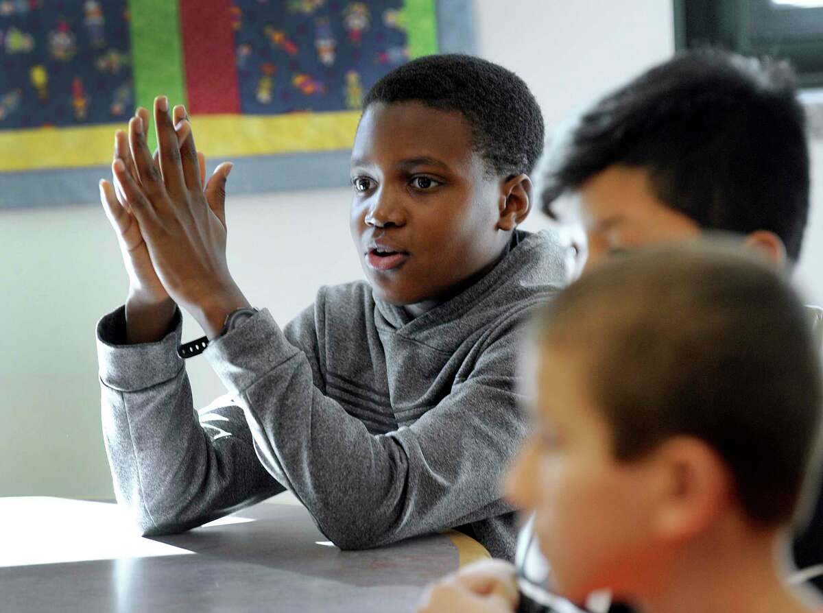 Western Connecticut Academy of International Studies in Danbury ranked No. 58 on U.S. News and World Report’s list of schools in Connecticut with the best test scores. The test scores are from 2018-19. In this Thursday, Jan. 25, 2018 file photo, Kieran Edwards, then 10, of Danbury, a student at Western Connecticut Academy for International Studies, talked about how a group that he is part of raises money for recess equipment.