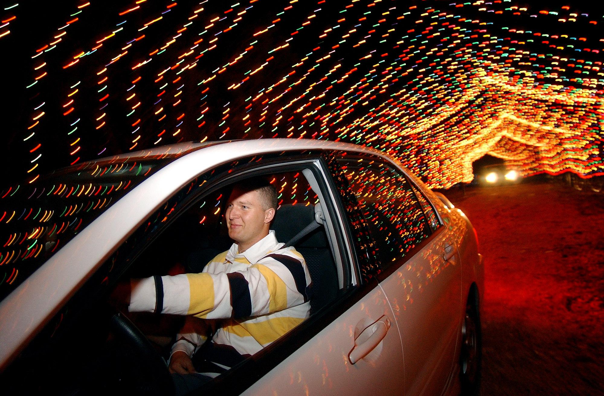 In New Braunfels, motorists at Santa’s Ranch Christmas lights