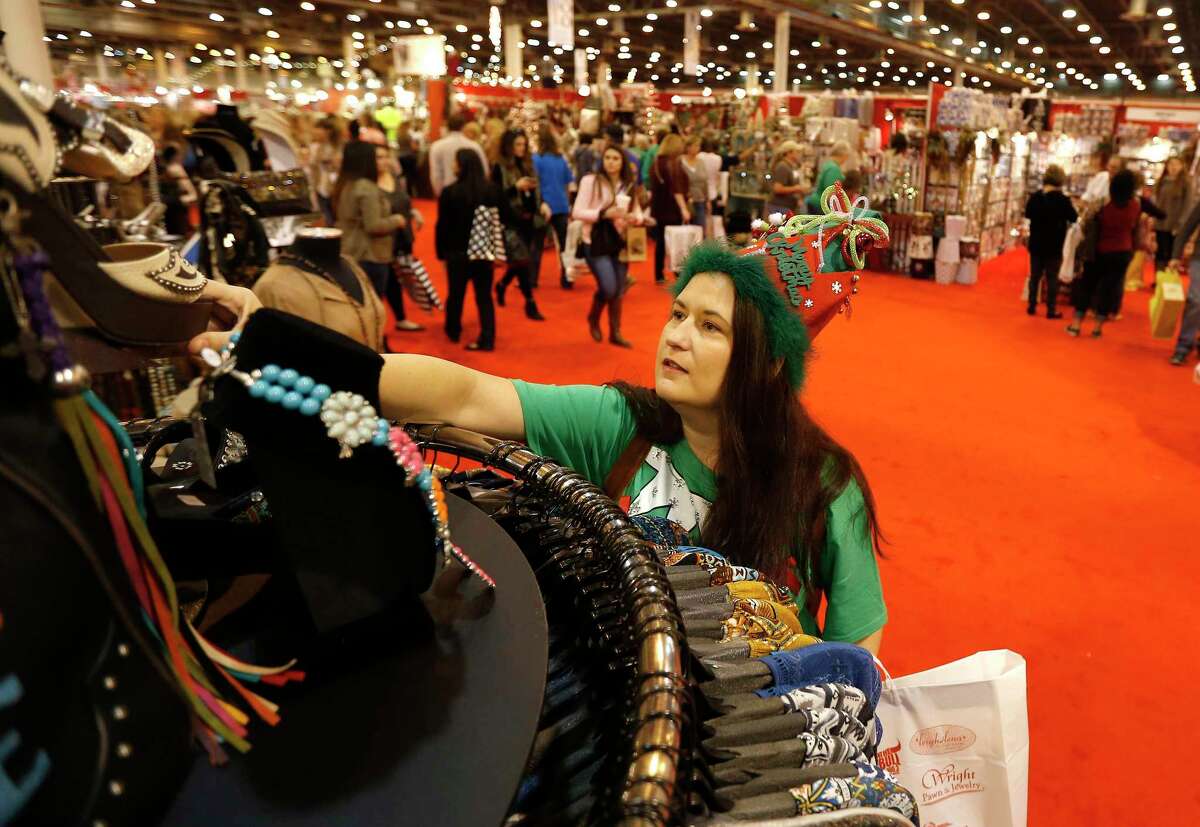 Sandra Fellers, of Cypress, shops at the Nutcracker Market on Saturday, Nov. 14, 2015, in Houston. ( Karen Warren / Houston Chronicle )