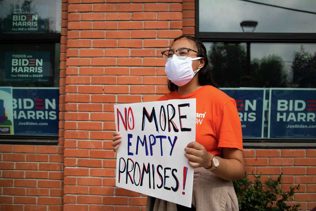 University of Houston biology student Katia Elisea Escobar, 18, attends a rally outside the Harris County Democratic Party offices, Wednesday, Oct. 20, 2021, in Houston. Katia is an undocumented immigrant and would be eligible for DACA if a Texas judge hadn't ended the program for new applicants.