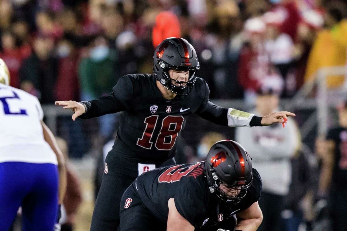 Stanford quarterback Tanner McKee (18] gestures before the play against Washington in the first quarter of an NCAA football game in Stanford, Calif., Saturday, Oct. 30, 2021. Washington won 20-13. (AP Photo/John Hefti)