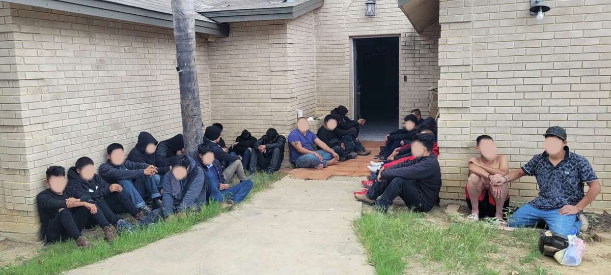 Federal and county authorities discovered 25 migrants inside a home in the 3500 block of South Louisiana Avenue. A woman was arrested in connection with the case.
