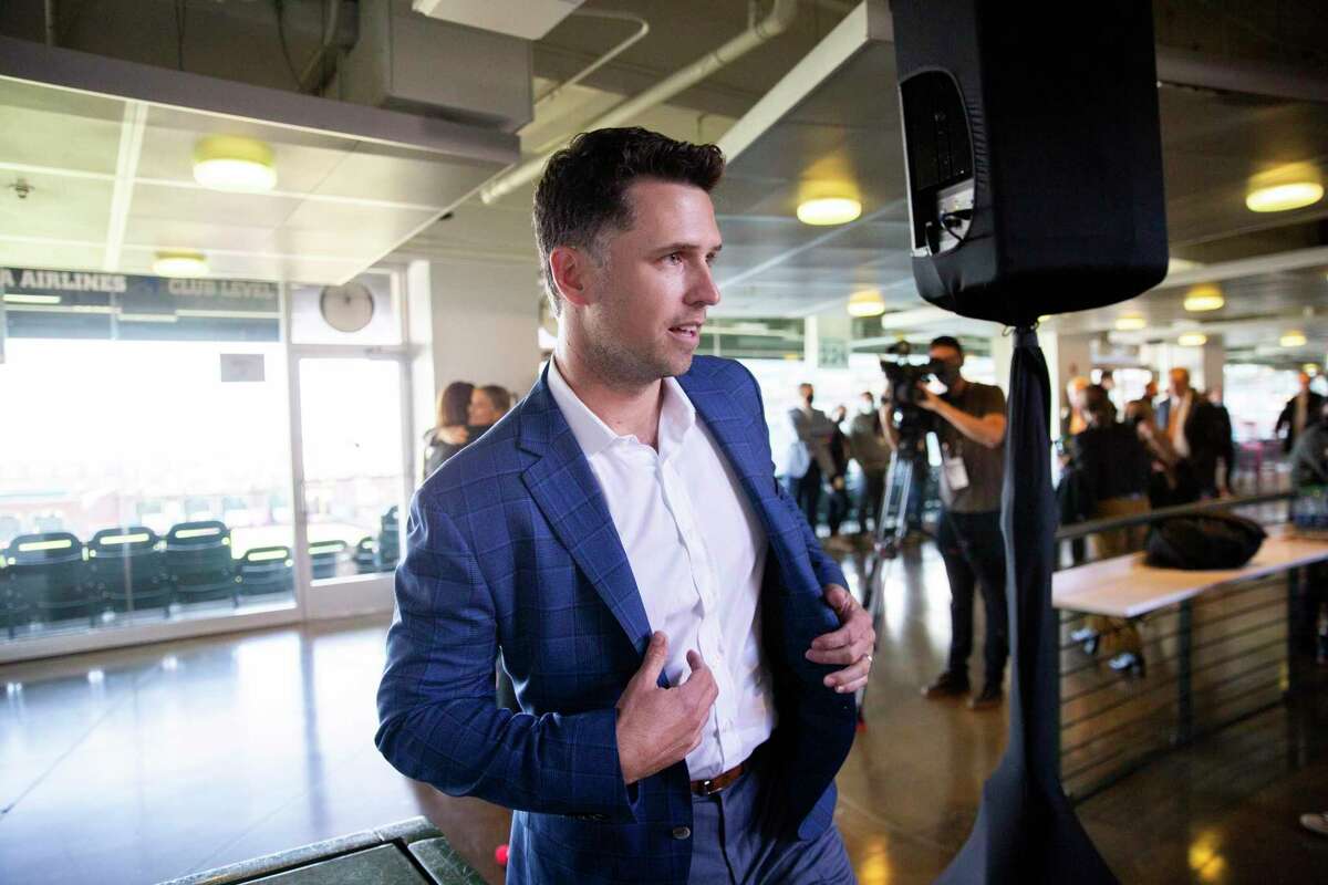 Buster Posey arrives at Oracle Park for a news conference to announce his retirement from Major League Baseball, Thursday, Nov. 4, 2021, in San Francisco, Calif. Posey is a seven-time All-Star catcher who has won three World Series championships with the San Francisco Giants.