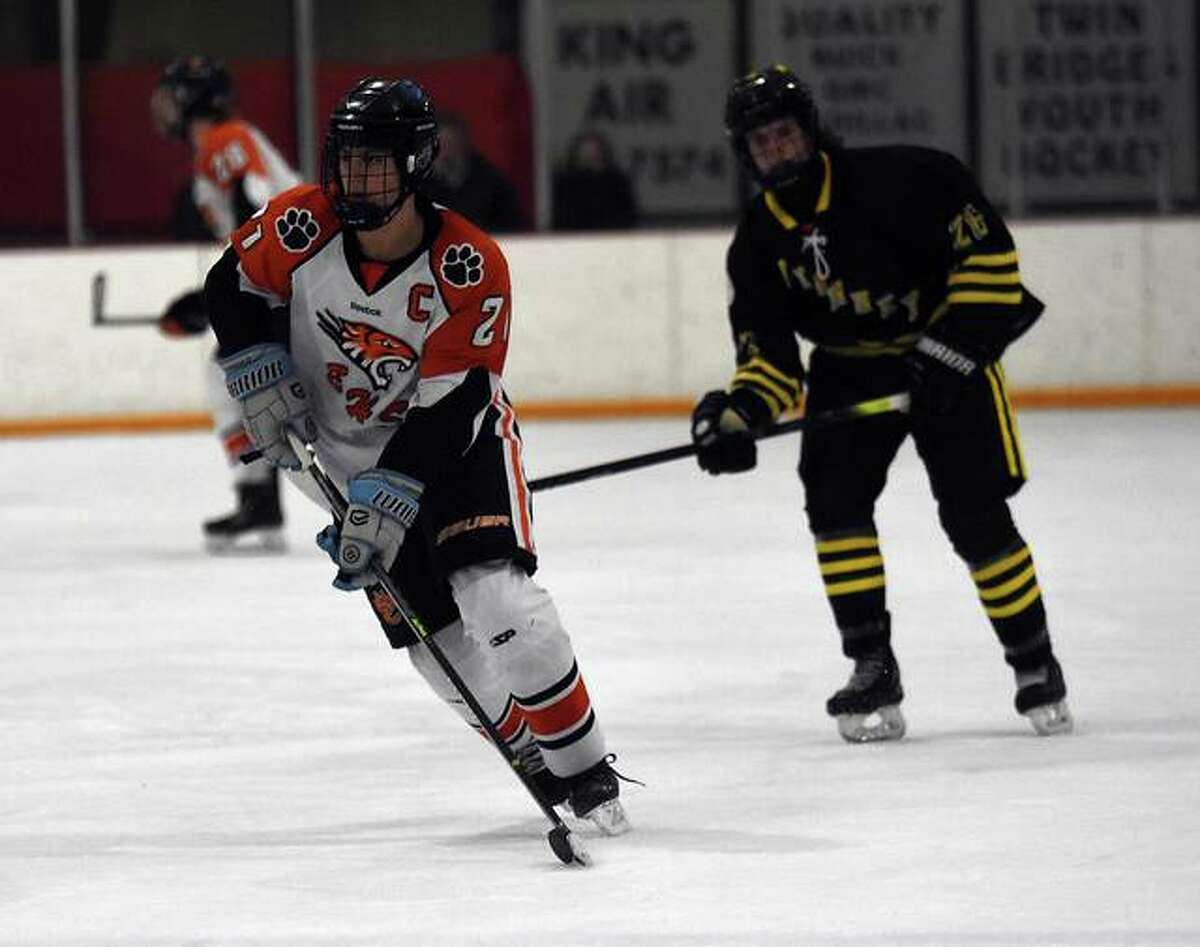 Edwardsville’s Codi Klenke skates the puck into the Vianney zone during the third period.