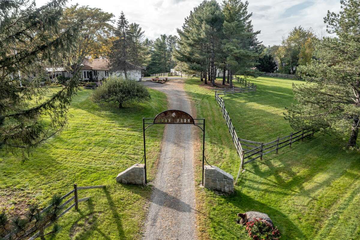 The home on 27 Trotta Lane in Morris, Conn. has over 3 acres of land and is a horse farm called Iron Horse Farm. 