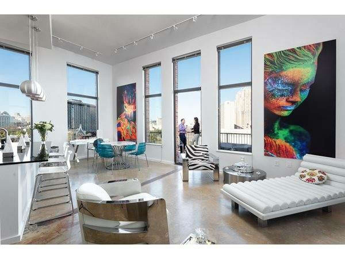 This two-bedroom give the open-concept new meaning as the tall windows open up the space.