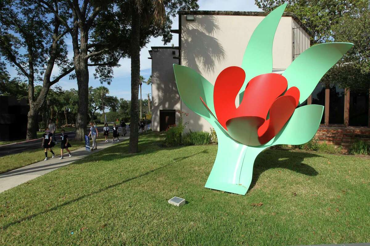 Students on a tour walk past artist Tom Wesselmann's "Standing Tulip" near the entrance to the McNay Art Museum.